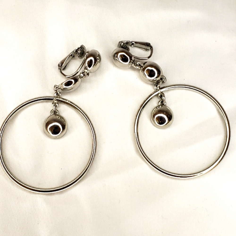Silver colored clip loop & dangle earrings